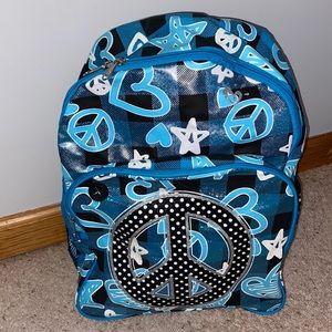 Justice backpack NWT- peace symbol with hearts and stars